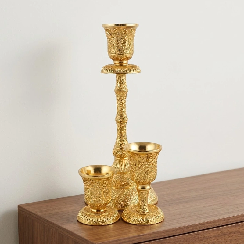 Trio of Golden Pewter Candel Stands